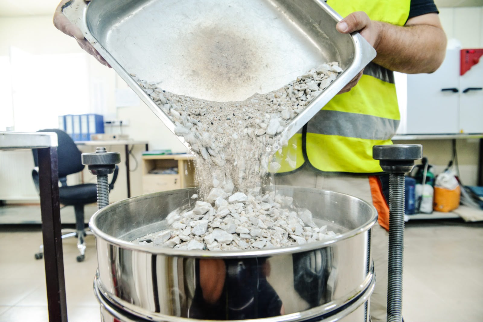 Technician testing construction materials in a laboratory